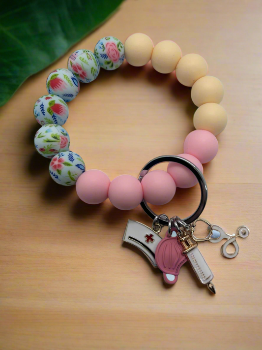 Nurse themed silicone beaded wristlet keychain with syringe and stethoscope charms